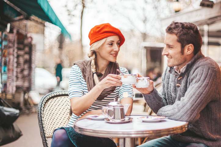Couple having tea in cafe in Paris